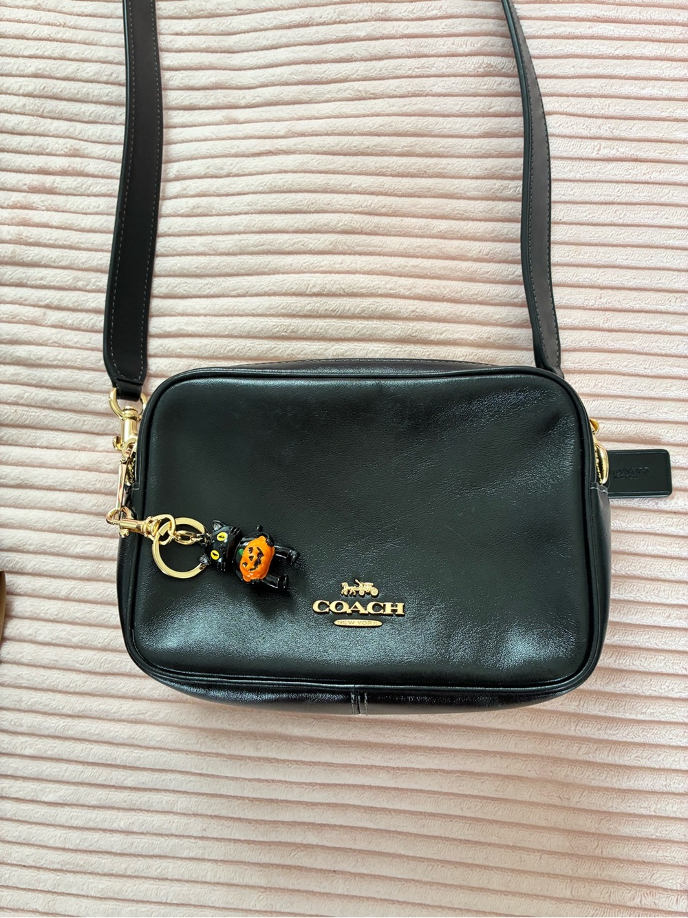 Coach Black Leather Crossbody with Gold Hardware and Pumpkin Charm